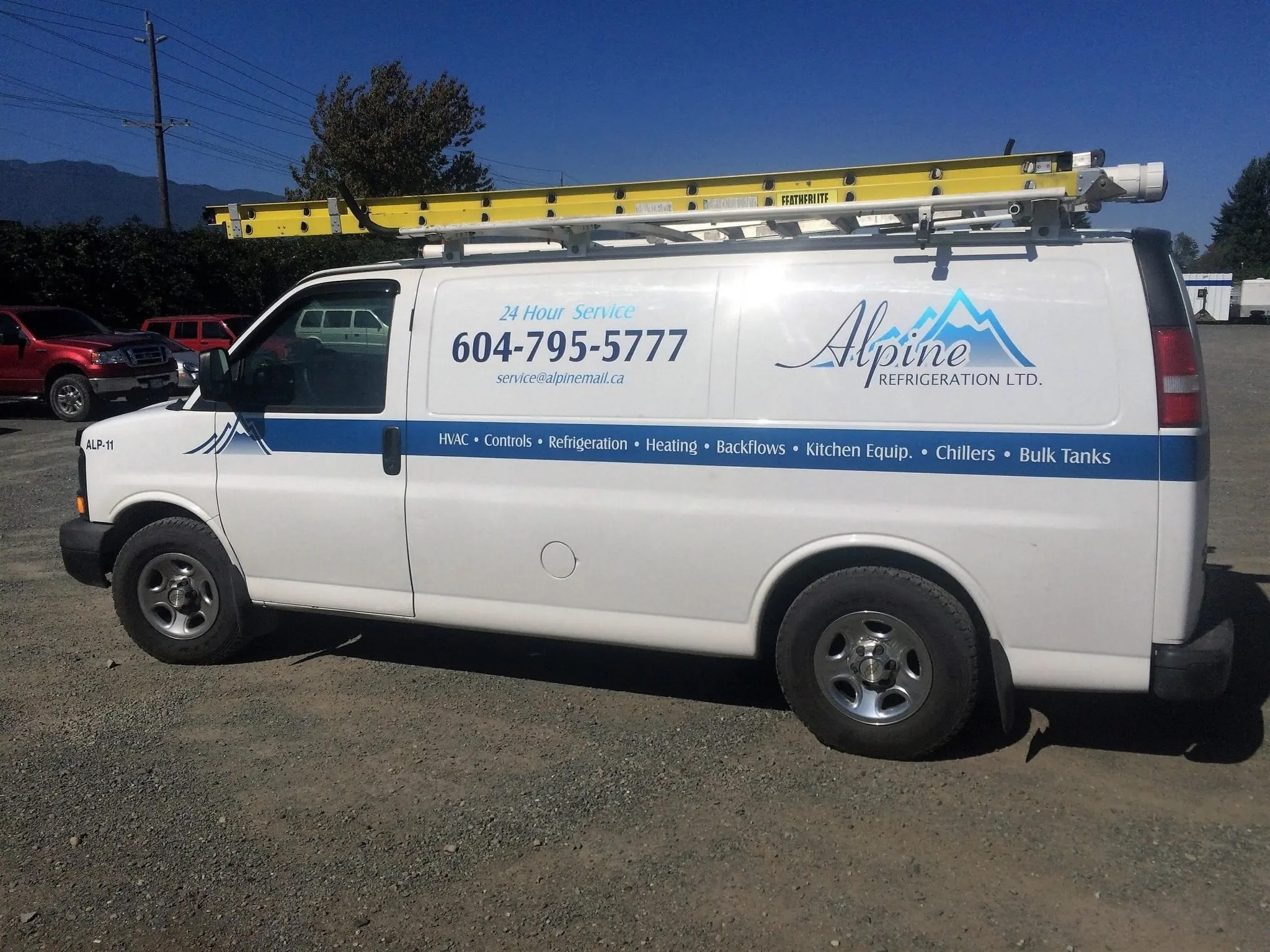 Refrigeration Repair Service Vehicle Alpine Refrigeration branded service van with equipment rack ready for refrigeration repairs
