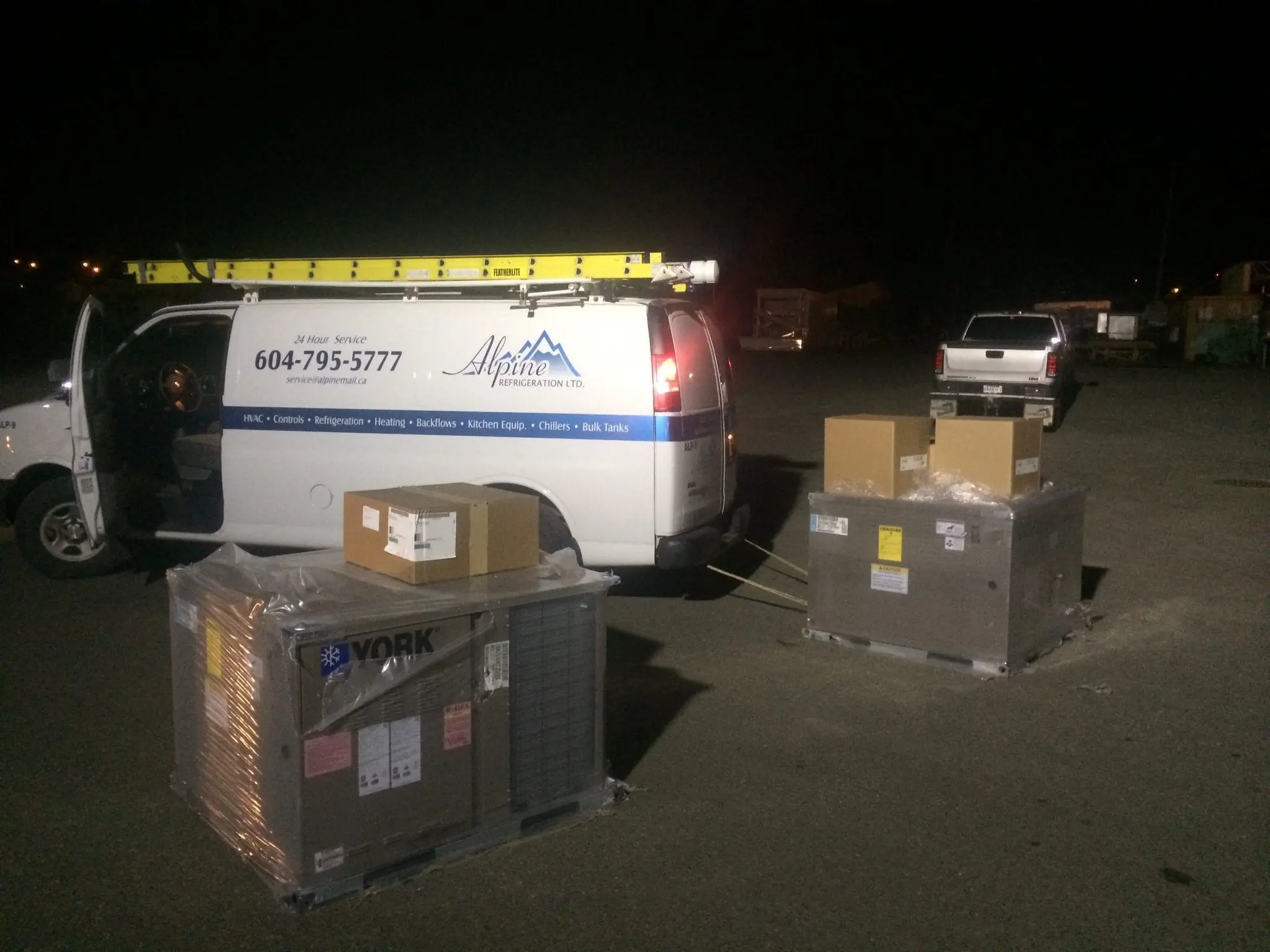 Emergency Night Service Call Alpine Refrigeration van loading York HVAC equipment for night emergency service